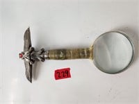 Large ornate magnifying glass