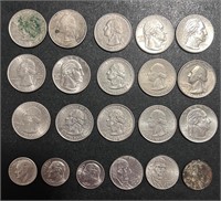 Lot of quarters, nickels, dimes, and a penny 99-23