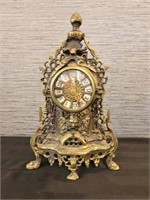 Reproduction of Ornate Heavy Metal Clock.
