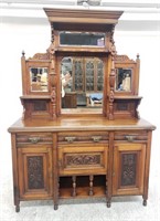 Victorian-style hutch with carved details