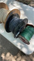Three rolls of copper wire, various gauges