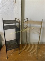 Set of plant stands, one black, one brass
