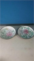 A pair of floral porcelain wrapped in brass low