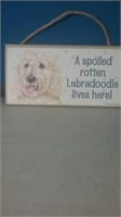 Spoiled rotten Labradoodle lives here sign