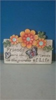 Wall plaque friends are the flowers in the G
