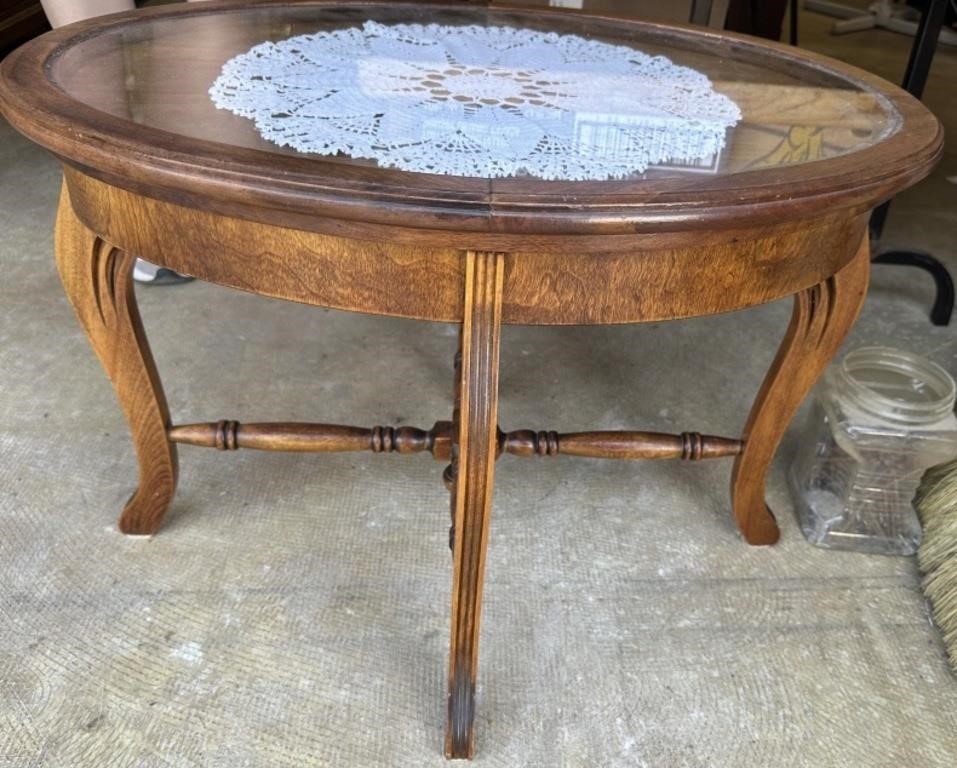 Antique table with removable framed glass top
