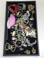 Costume jewelry and findings. Tray not included