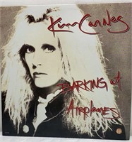 Kim Carnes - barking at airplanes