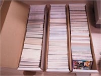 Three boxes of football cards