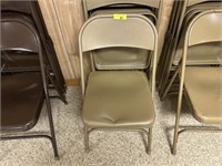 4 tan folding chairs