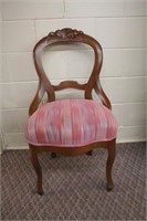 Carved balloon back upholstered hip rest chair,