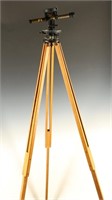 Antique Surveyorâ€™s transit with tripod