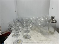 Lot of glass and plastic drinking glasses