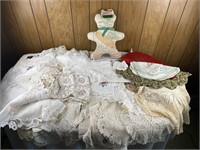 Large selection of doilies/lace