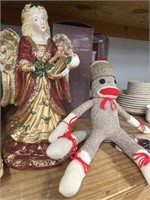 Angel Figurine And Sock Monkey