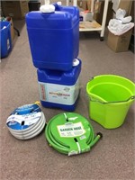 Water jugs, hose , bucket
