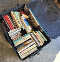 Rolling suitcase full of books