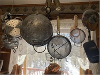 Large lot of strainers, sifters and cooking pots
