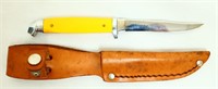 Yellow handle knife w/ leather sheath
