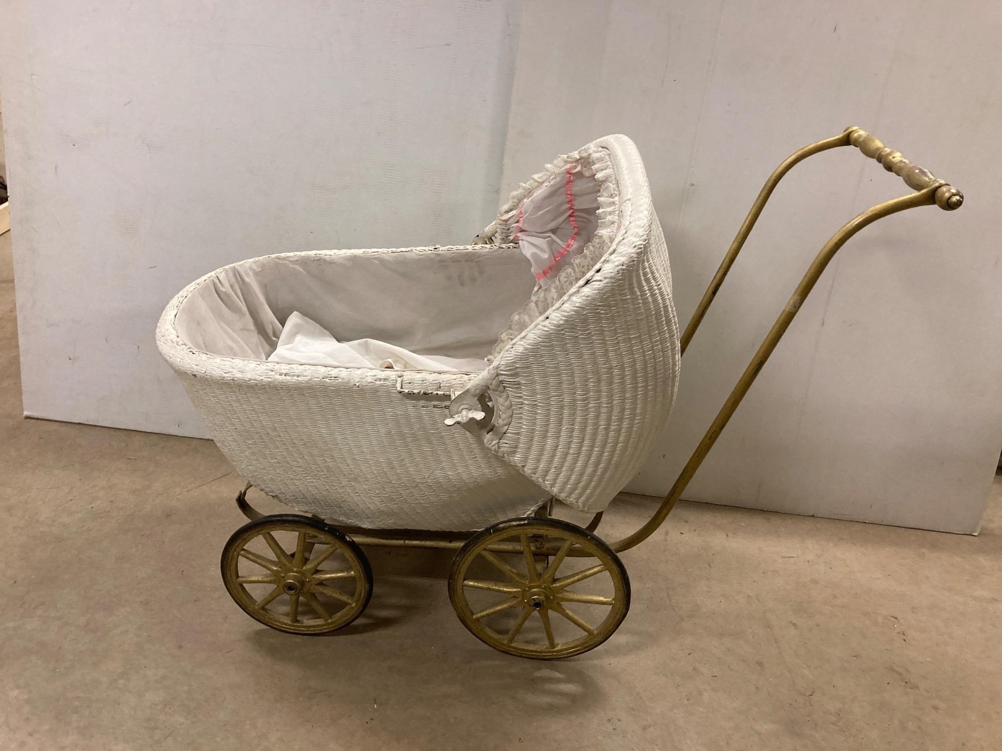 Retro baby carriage. Cast Iron & Wicker.