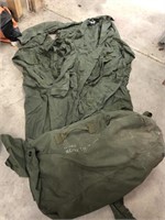 Green coveralls size large with army duffel bag
