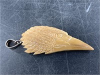 Mammoth ivory eagle's head pendant