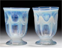 COLONIAL PAIR OF FOOTED TUMBLERS, fiery