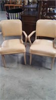 two metal office chairs