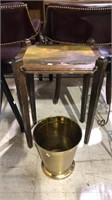 Pine side table and a brass wastebasket, table is