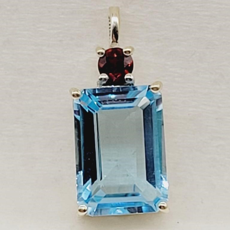 BLUE TOPAZ & GARNET SET IN STERLING SILVER