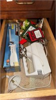 Two drawer contents one Black & Decker slice