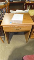 Kenmore sewing machine in sewing table