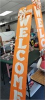 LARGE ORANGE WELCOME SIGN