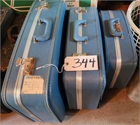 (3) Matching Suitcases