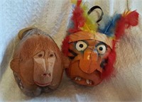 Carved coconut monkey and Indian heads