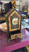 Quartz table top clock with drawer.  Clock made