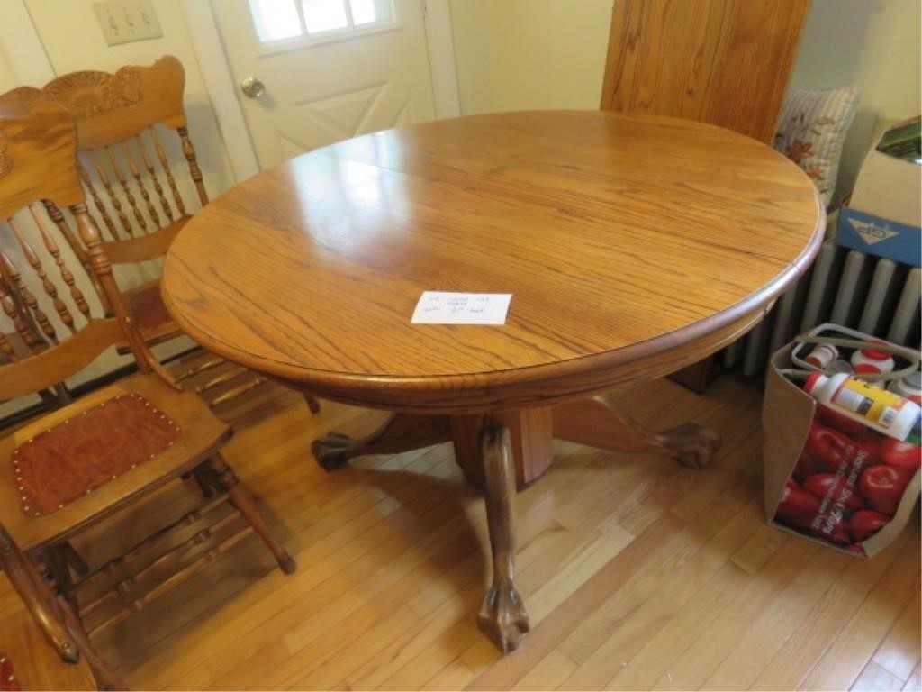 48" ROUND OAK TABLE WITH 21" LEAF