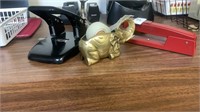Office supplies, red stapler, golden colored