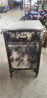 1 Vintage Metal Cabinet On Wheels