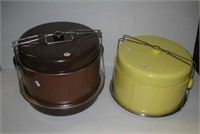 (2) Vintage metal cake carriers. Largest measures