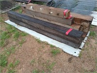 Pile of cross ties and cedar boards