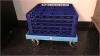 Blue dish rack trays on cart