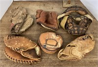 Vintage baseball gloves & catchers mask