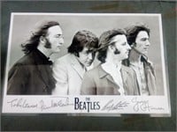 "The Beatles" Laminated Picture Has Facsimile