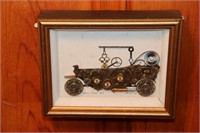 Framed 1914 Model T Ford made out of watch parts