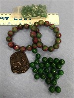 Lot of jade beads, some faceted various sizes    (