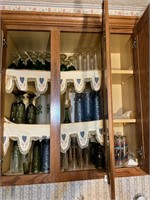 4 shelves of misc glasses, blue & green glass