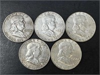 Five Franklin Half Dollars