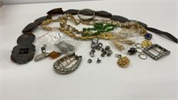 Misc jewelry lot: leather and silver toned belt,