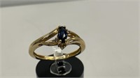 10kt gold 6.5 ring with blue gemstone, 1.9 grams